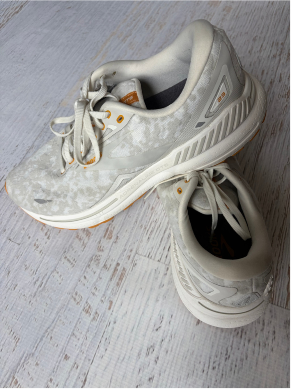 Women's Brooks Adrenaline GTS 23 Sneakers in White and Orange/Yellow